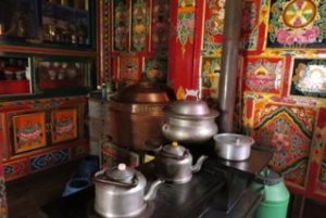 kitchen with walls of thangka paintings