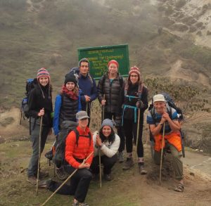 group photo of professors and students in mountain trekking gear