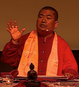 monk giving talk