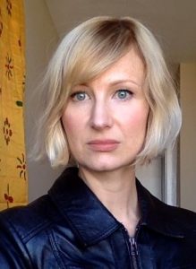 portrait of short haired blonde woman