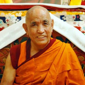 portrait of smiling older monk