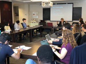 academics sitting around conference table